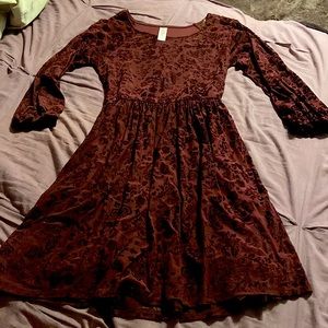 It’s a Justice lace dress in perfect condition!! It’s really cute and flowy!